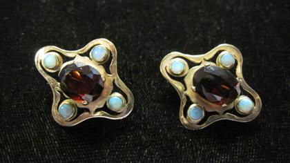 Appraisal: karat yellow gold opal and garnet earringsOval cut garnet prong