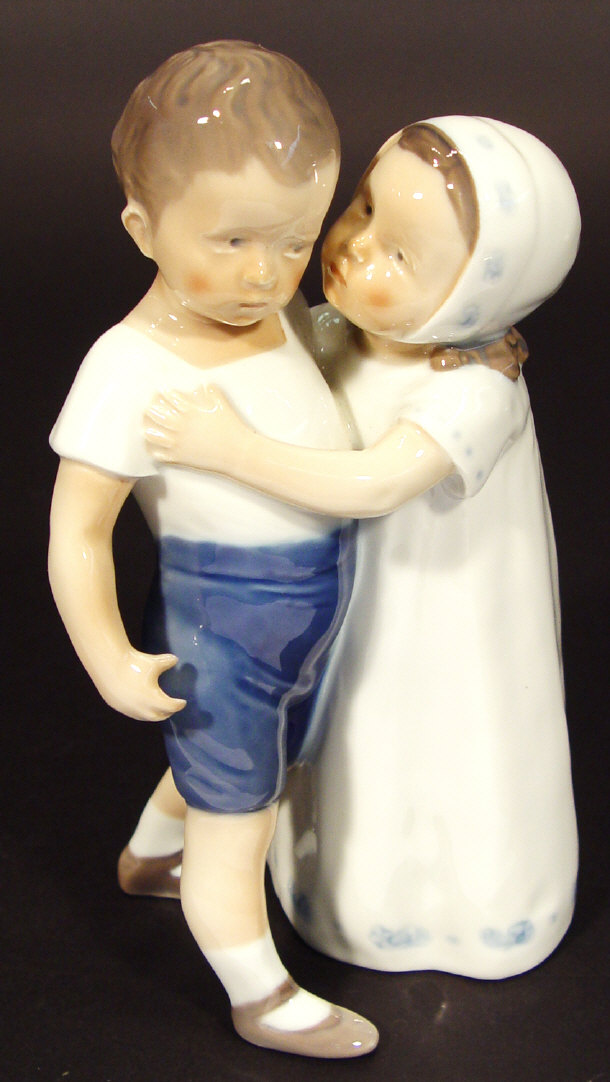 Appraisal: Royal Copenhagen china figure group of two young children kissing