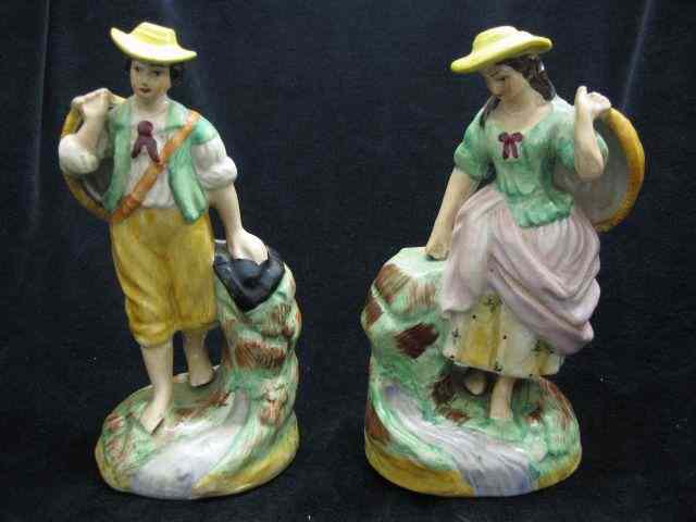 Appraisal: Staffordshire Pottery Figurines of Peasant Boy Girl '' tall fine