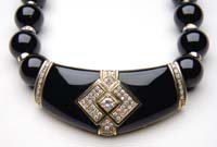 Appraisal: ONYX DIAMOND NECKLACE Lovely designer-type necklace features a line of