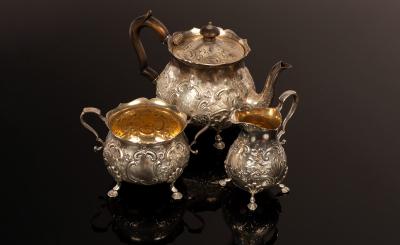 Appraisal: A late Victorian three-piece silver tea service Pearce Sons Ltd