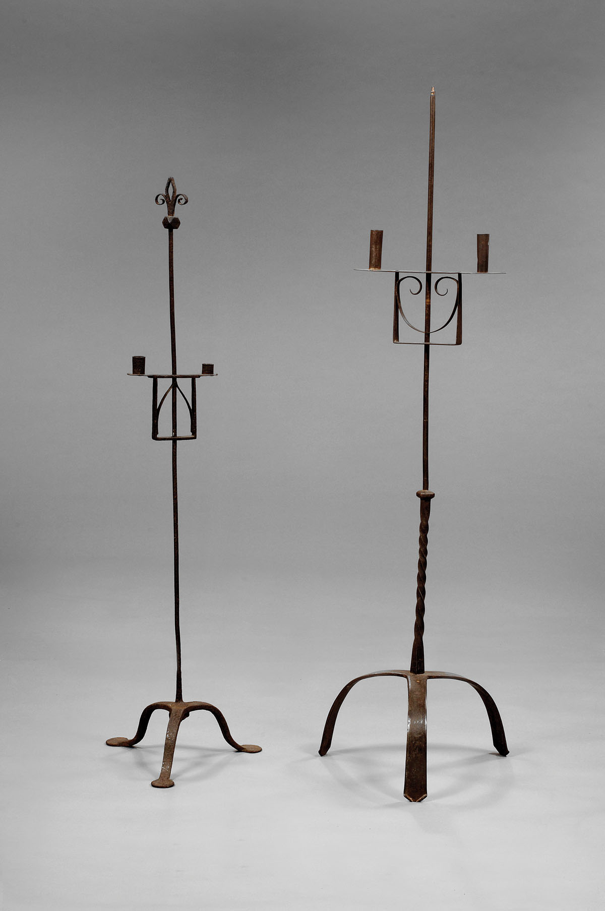 Appraisal: TWO-LIGHT IRON AND STEEL CANDLESTAND WITH SPIRAL TWIST STANDARD AND