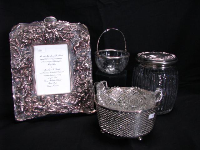 Appraisal: Group of sterling and cut glass accessories including embossed sterling