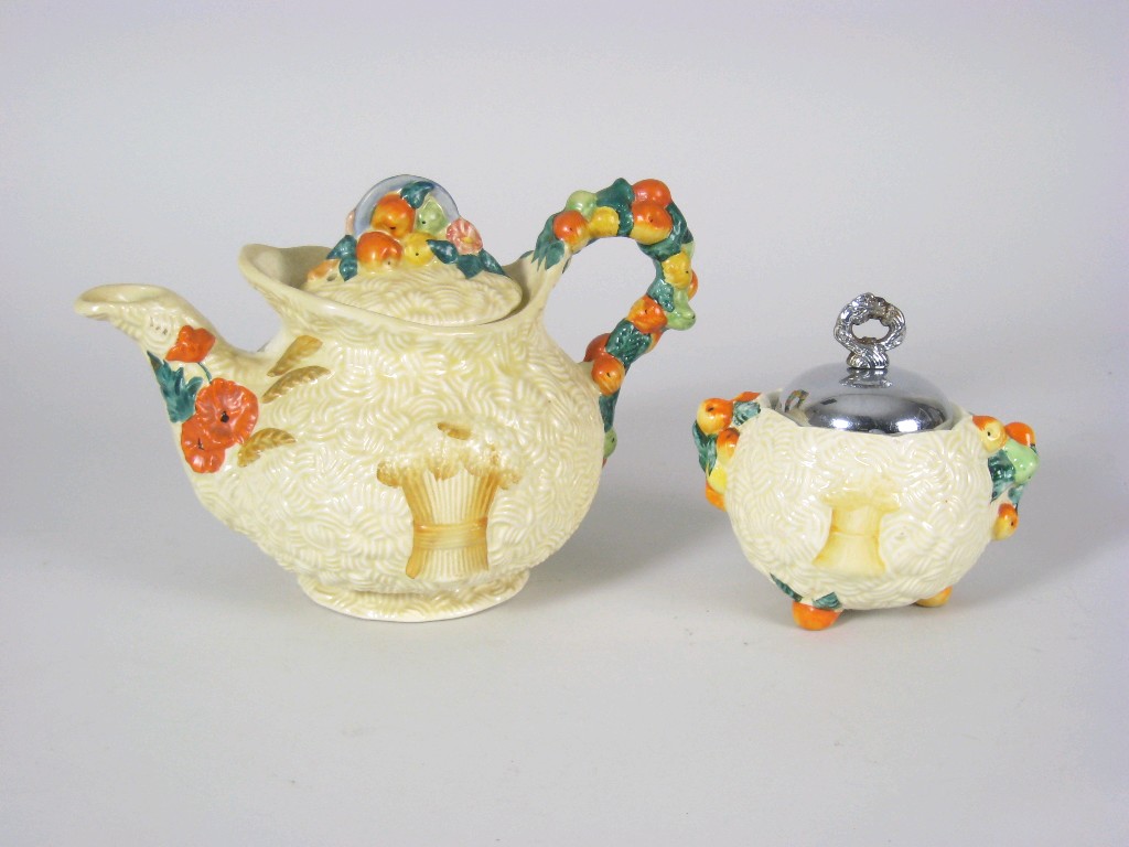 Appraisal: A Clarice Cliff Celtic Harvest Teapot and Sugar Bowl with