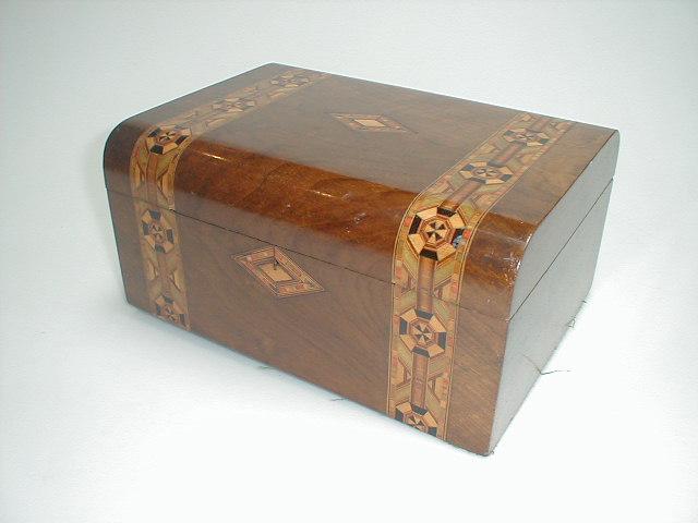 Appraisal: A thC walnut box the domed cover with inlaid marquetry