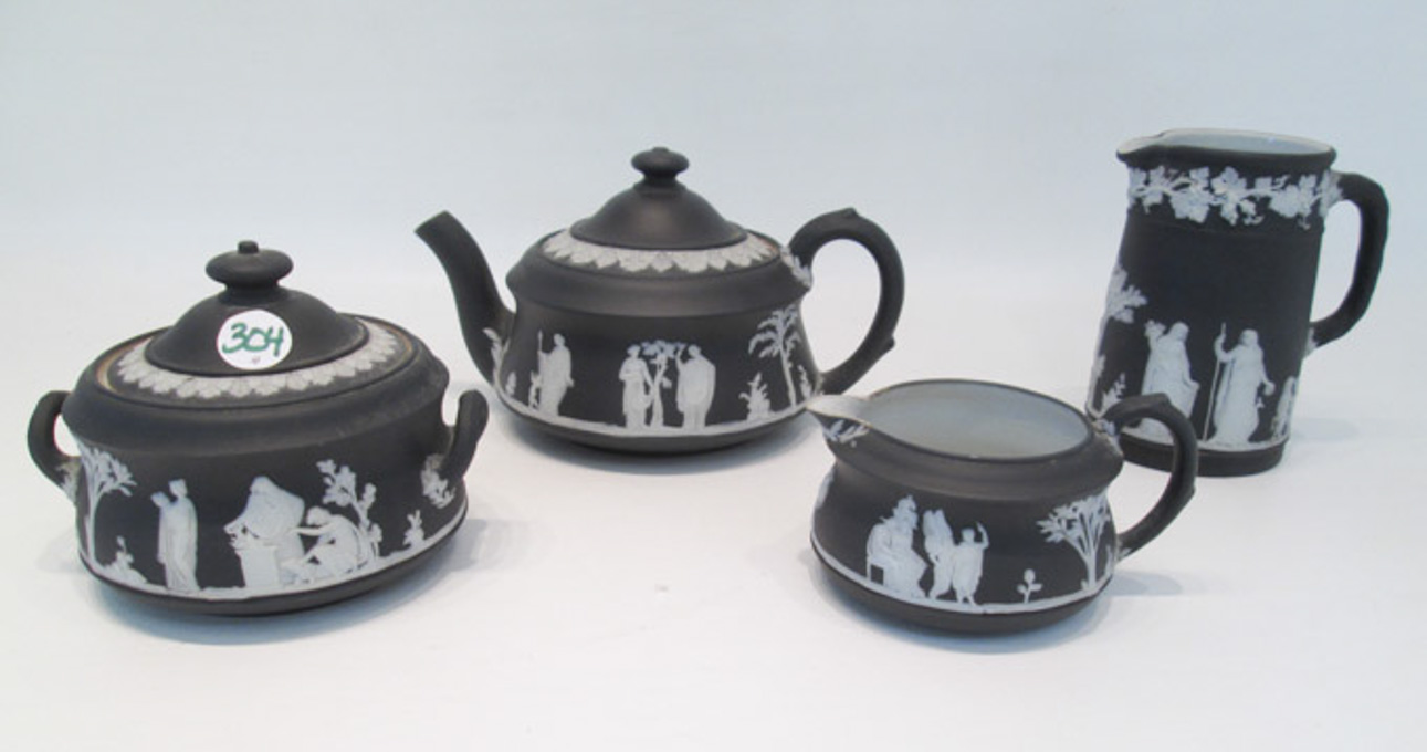 Appraisal: FOUR PIECES BLACK WEDGWOOD JASPERWARE TEA SERVICE including tea pot