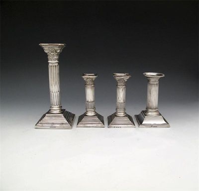 Appraisal: A pair of silver dwarf candlesticks by Nathan and Hayes