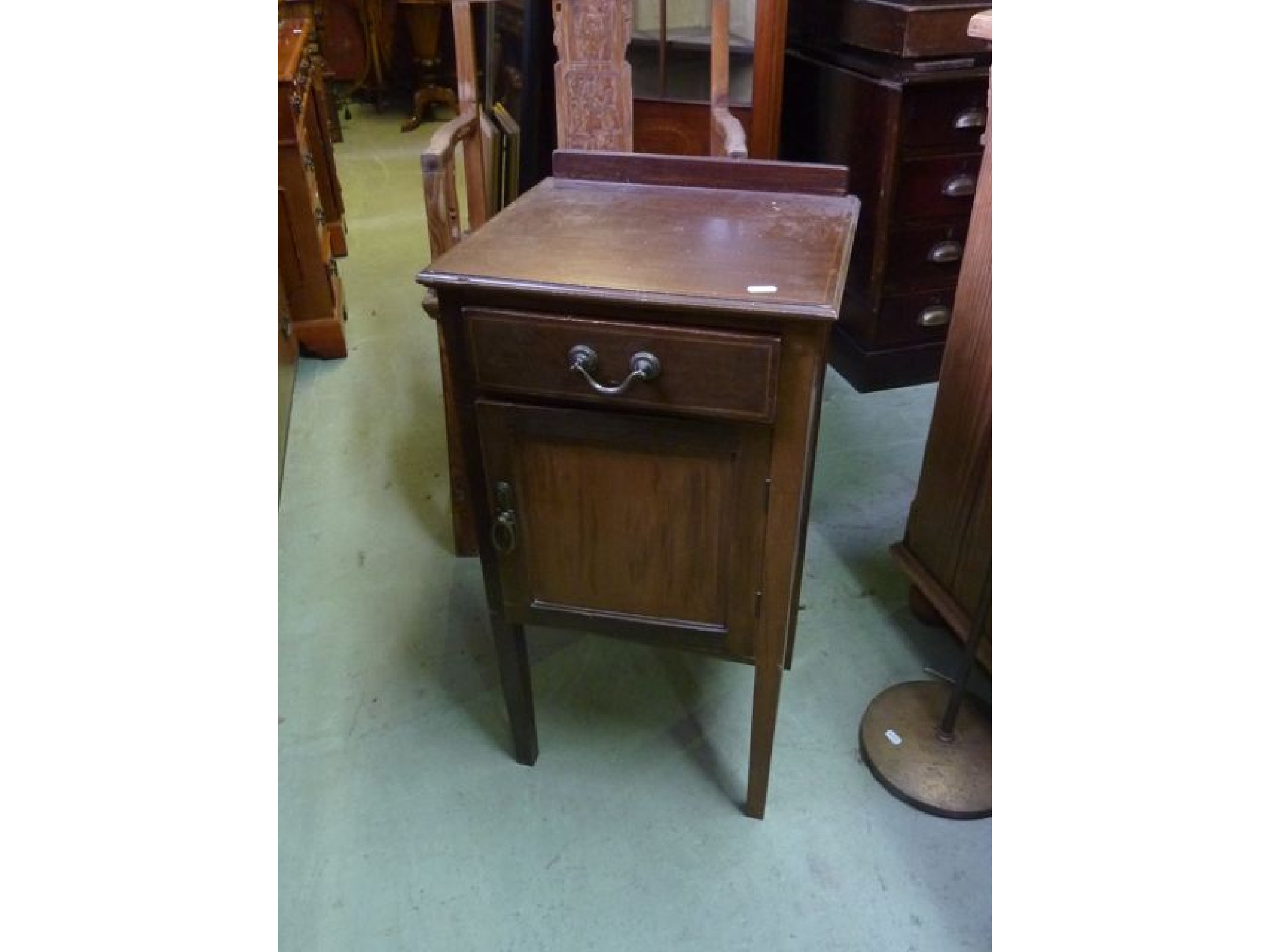 Appraisal: An inlaid Edwardian walnut pot cupboard of square cut form