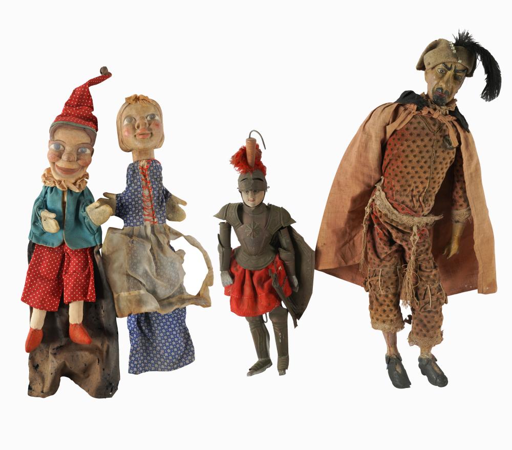 Appraisal: FOUR ASSORTED PUPPETSthe knight in armor inches high not including