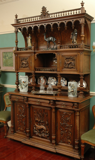 Appraisal: A LARGE AND IMPRESSIVE TWO TIER WALNUT CONTINENTAL SIDE BOARD