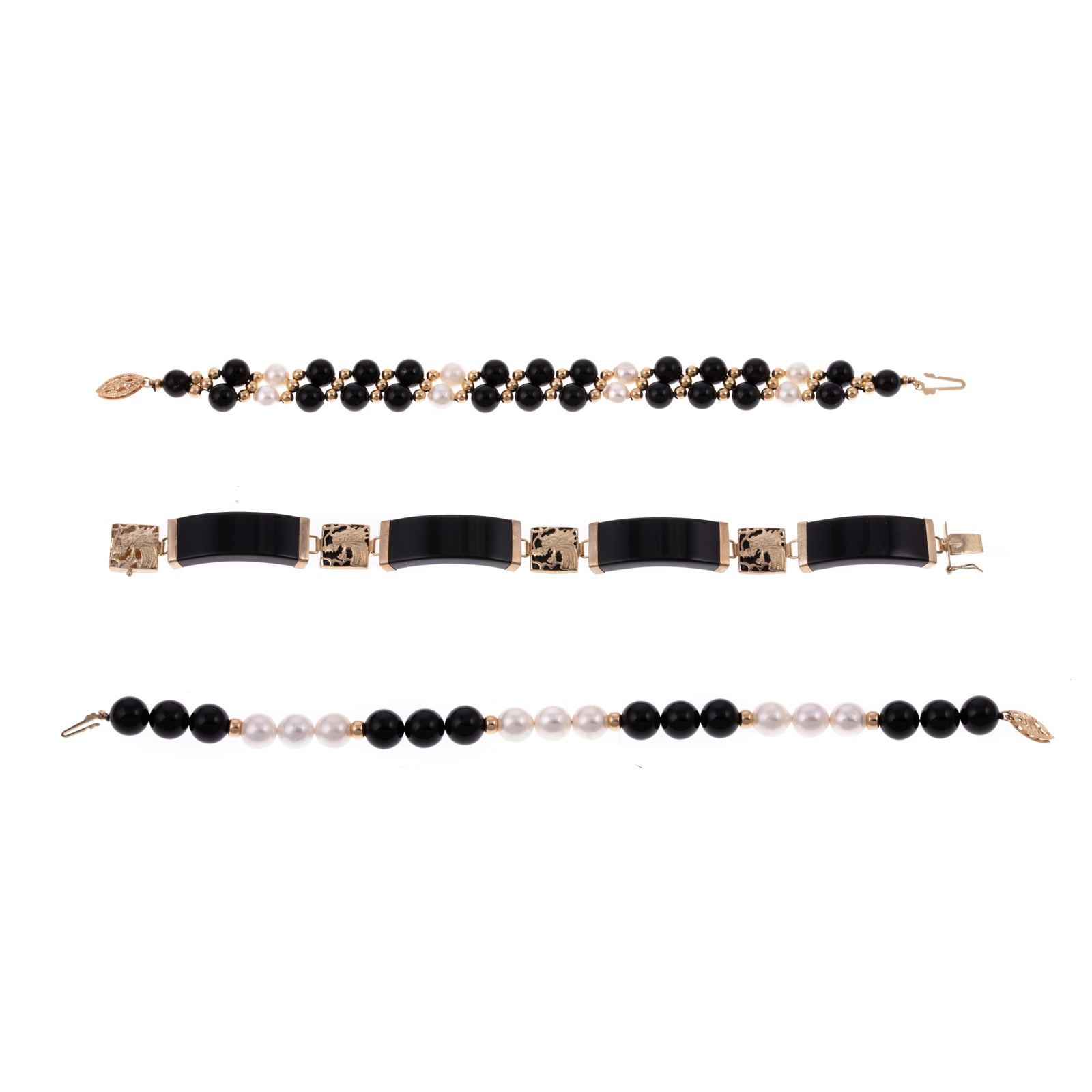 Appraisal: A TRIO OF BLACK ONYX PEARL BRACELETS IN K K