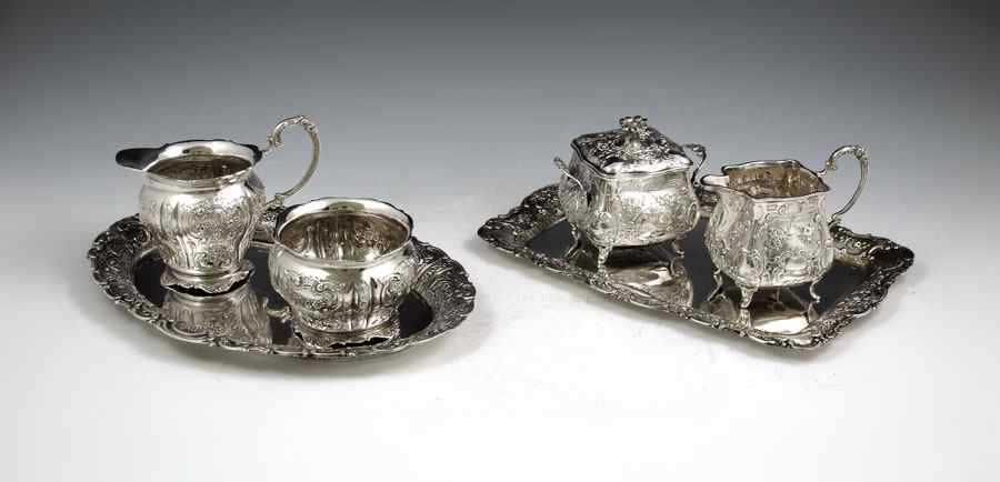 Appraisal: PIECE GERMAN SILVER CREAMERS SUGARS TRAYS To include Oval repousse