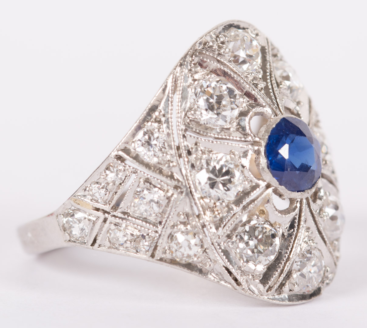 Appraisal: A Sapphire and Diamond Ring platinum filigree approximately tdcw and