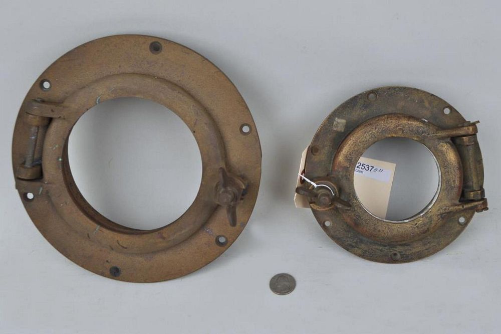 Appraisal: Two Bronze Ships' Portholes the largest diameter smallest diameter Some