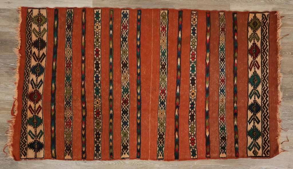 Appraisal: Caucasian rug Polychromatic arrow motifs Wear throughout losses to fringe