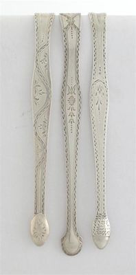 Appraisal: Three pairs of George III bright-cut tongs by Hester Bateman