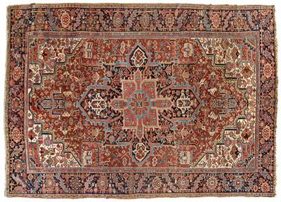 Appraisal: Heriz rug typical design on a red field corner work