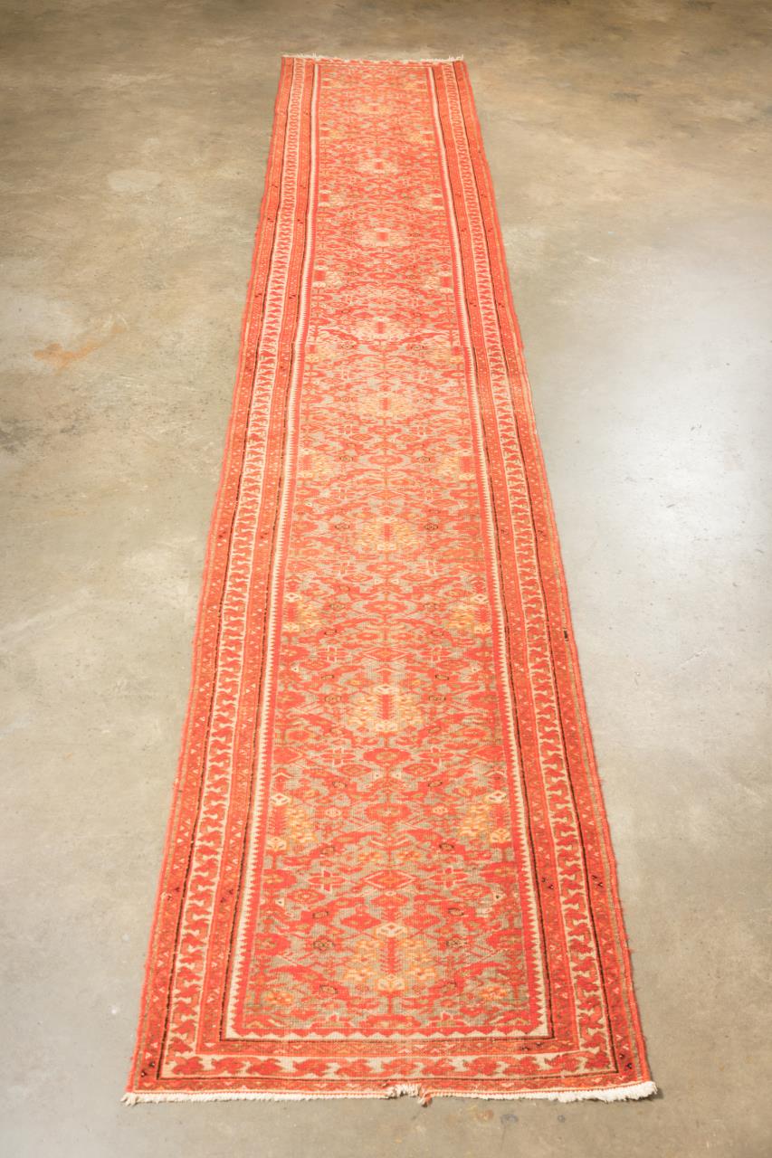 Appraisal: HAND KNOTTED PERSIAN HERIZ RUNNER X Hand knotted wool on