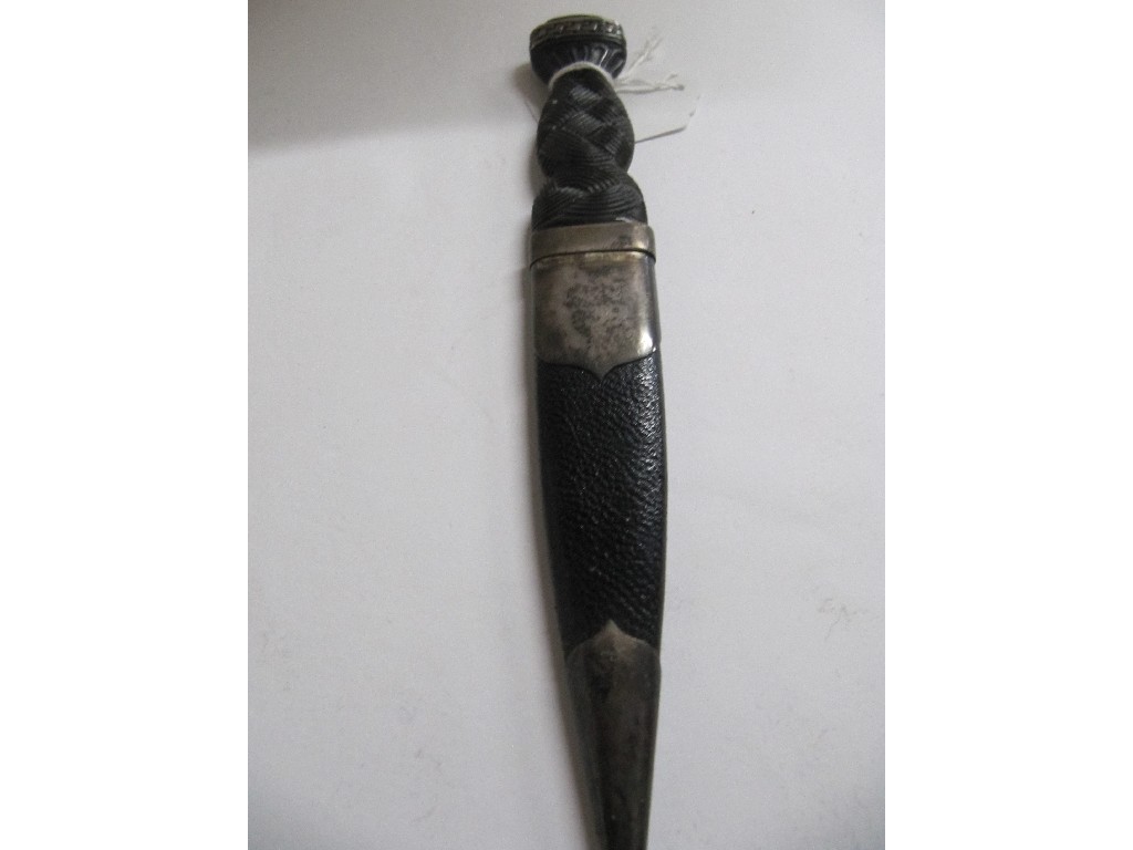 Appraisal: A sterling silver mounted skean dhu