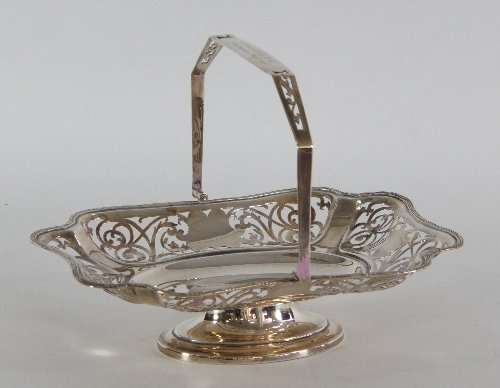 Appraisal: A pierced silver cake basket Birmingham with pierced border and