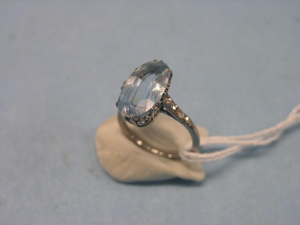 Appraisal: A white metal aquamarine and diamond ring large oval faceted