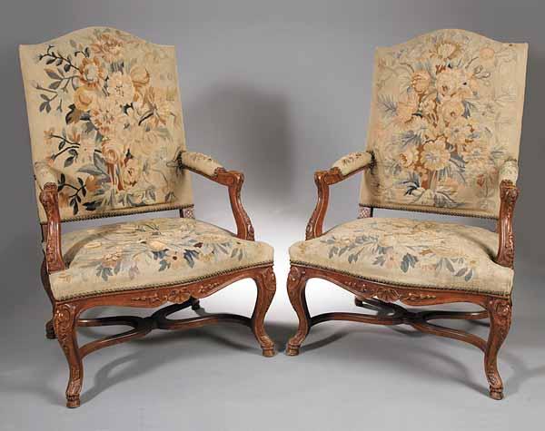 Appraisal: A Pair of Louis XIV-Style Carved Fruitwood Fauteuils la Reine