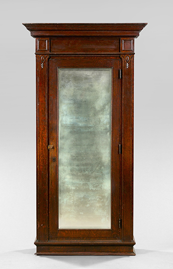 Appraisal: Large American Late Victorian Oak Armoire ca the top with