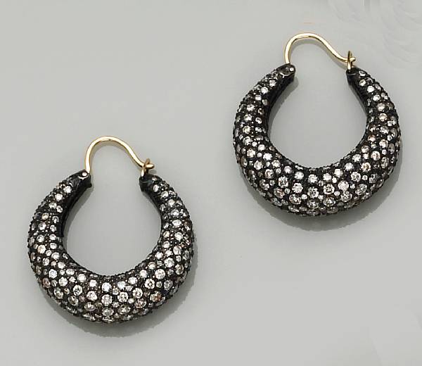 Appraisal: A pair of diamond and eighteen karat blackened gold earrings