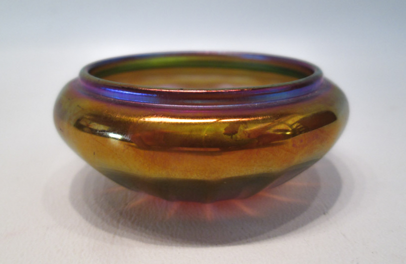 Appraisal: QUEZAL ART GLASS SALT gold iridescent having ribbed sides Engraved