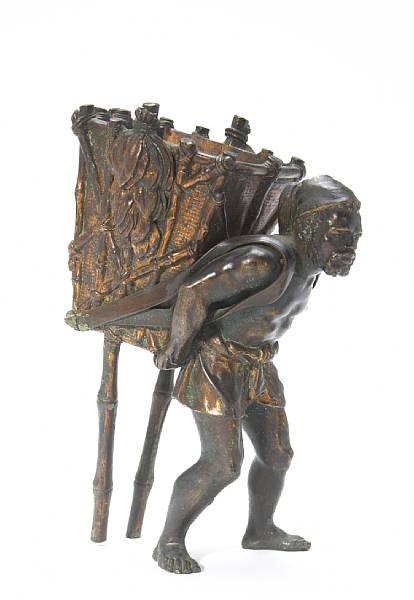 Appraisal: A bronze figure with basket on back height in Steve