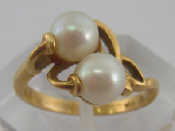 Appraisal: A yellow metal tests carat gold two cultured pearl ring