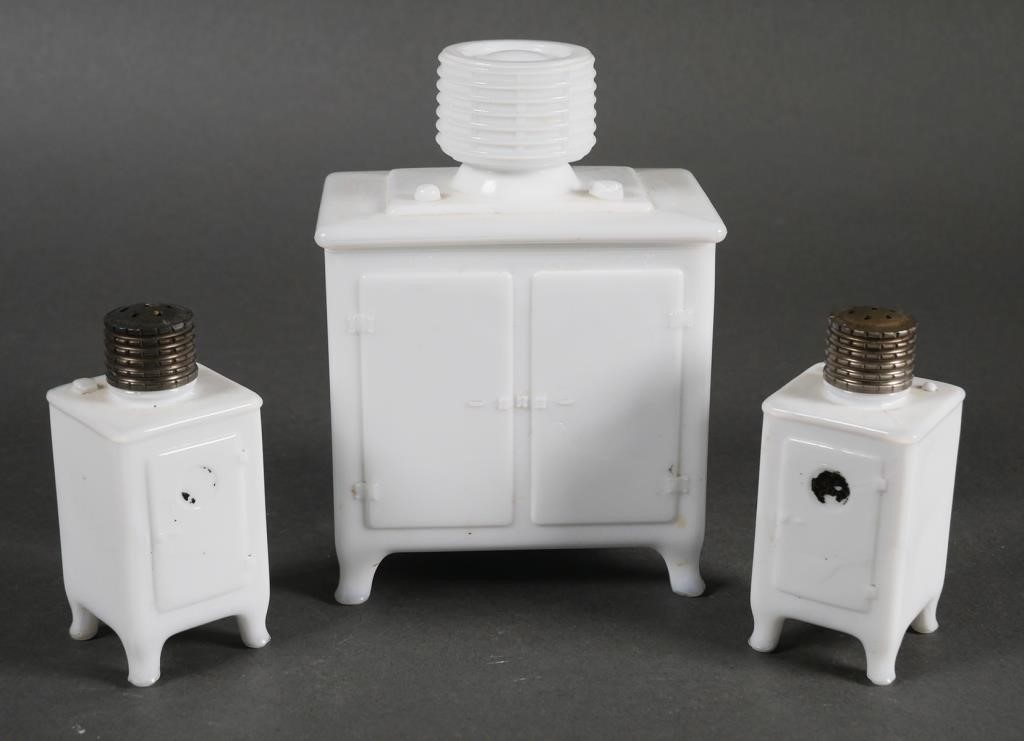 Appraisal: General Electric milk glass white salt pepper shakers with lidded