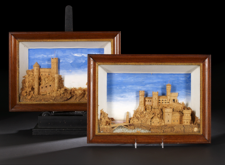 Appraisal: Good Pair of Continental Elaborately Carved Cork Castles in Shadowboxes