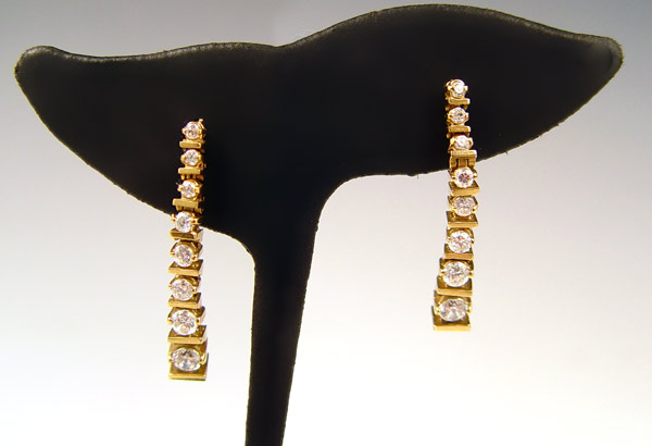 Appraisal: K SAPPHIRE DANGLE EARRINGS K yellow gold earrings contain round