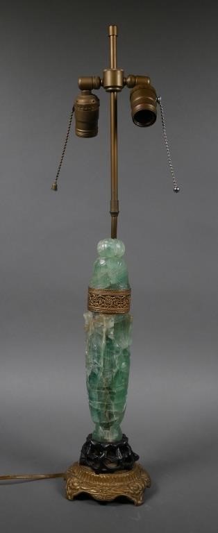 Appraisal: Jade-colored carved quartz lamp with brass fittings Overall height Circa