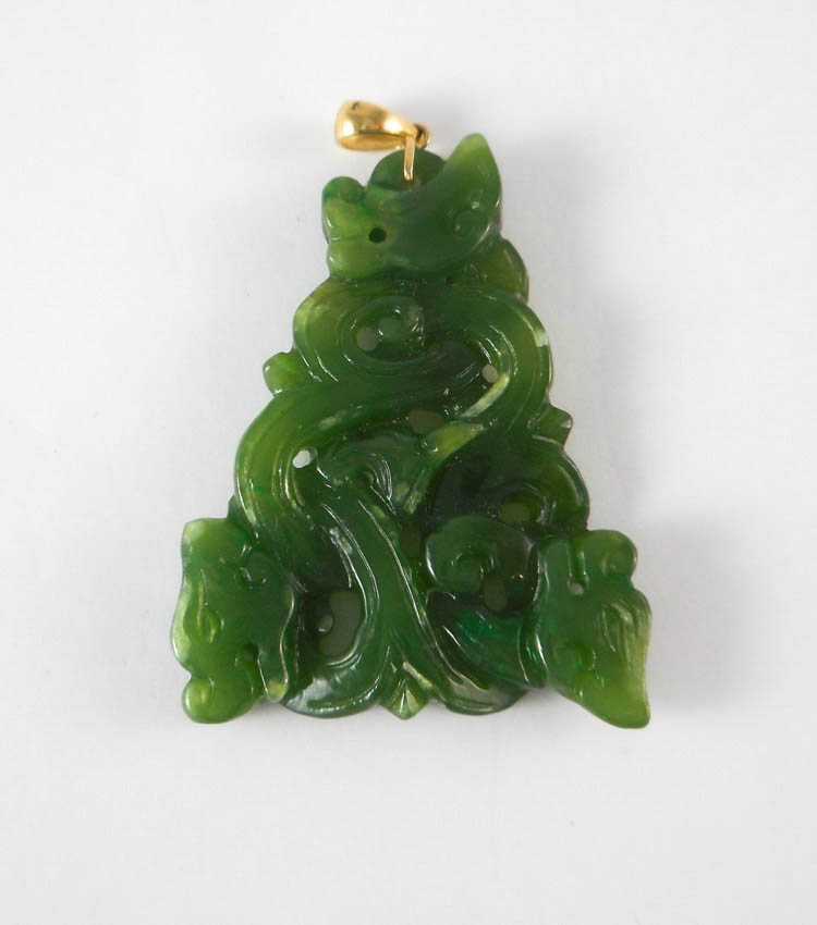 Appraisal: MASON KAY GREEN NEPHRITE JADE PENDANT with Mason Kay certificate