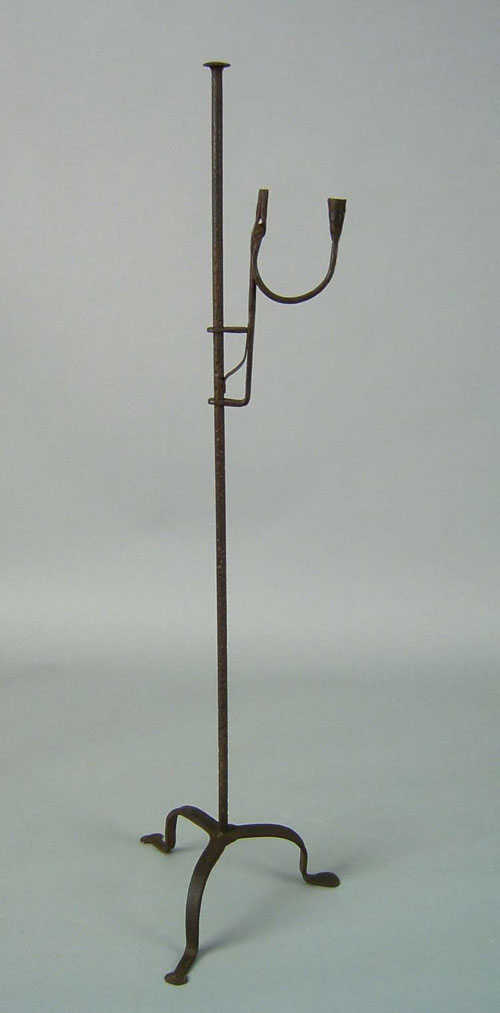 Appraisal: Wrought iron floor standing rush light th c with candlecup