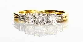 Appraisal: An ct gold three stone round brilliant cut diamond ring