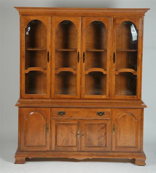 Appraisal: ETHAN ALLEN BREAKFRONT CHINA CABINET Two piece rock maple with