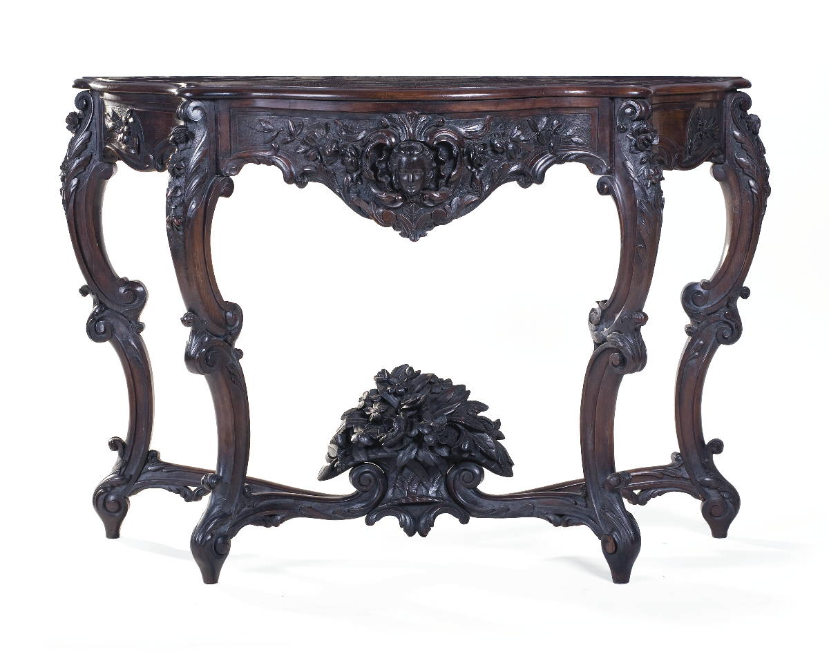 Appraisal: NEW YORK ROCOCO REVIVAL CARVED WALNUT CONSOLE TABLE The shaped