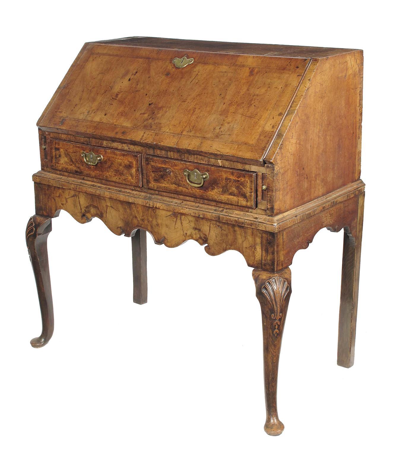 Appraisal: A walnut bureau on stand