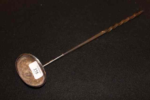 Appraisal: A GEORGIAN SILVER TODDY LADLE with inset coin decoration and