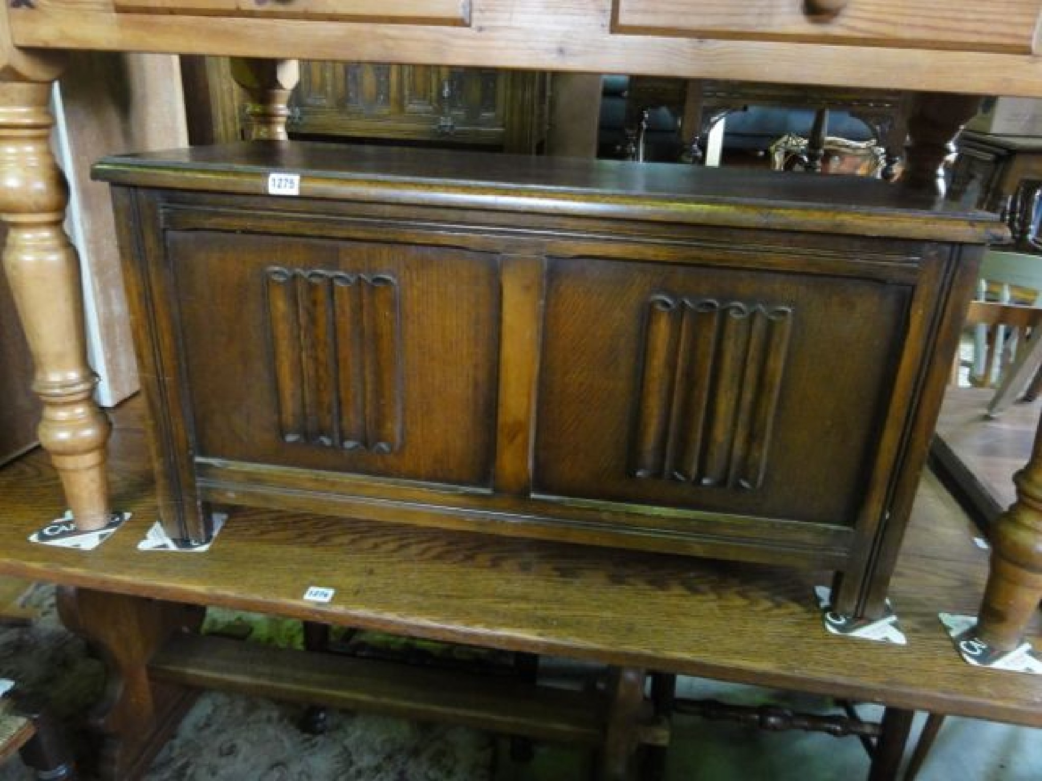 Appraisal: An oak blanket box in the form of a reproduction