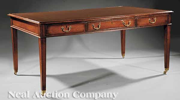 Appraisal: An Antique Georgian-Style Mahogany Partner's Table molded top with inset