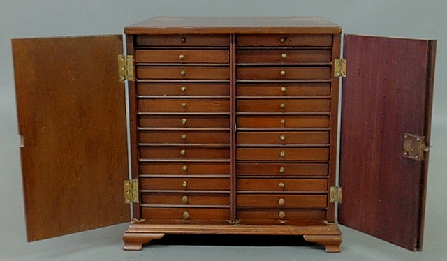 Appraisal: Miniature mahogany specimen chest c with dovetailed construction multi-drawered interior