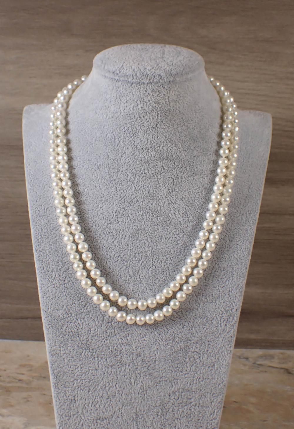 Appraisal: PEARL AND FOURTEEN KARAT GOLD NECKLACE the seventeen inch double