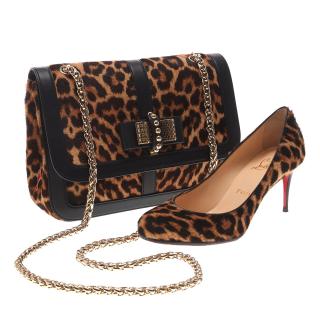 Appraisal: Christian Louboutin leopard handbag and pumps Christian Louboutin leopard handbag