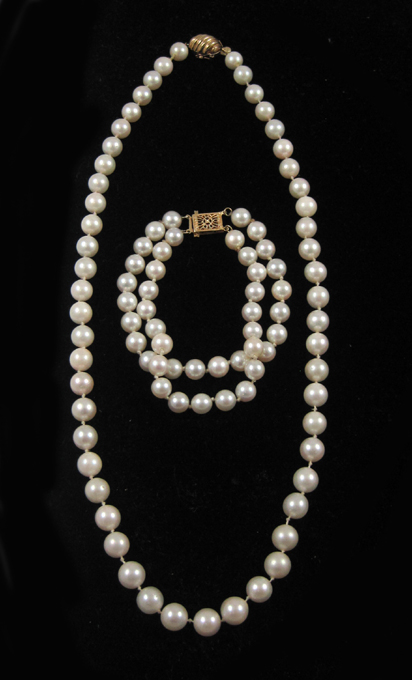 Appraisal: TWO ARTICLES OF PEARL AND FOURTEEN KARAT GOLD JEWELRY including