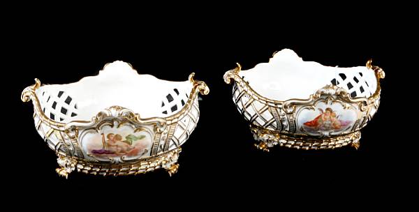 Appraisal: A pair of Continental gilt heightened porcelain center bowls height