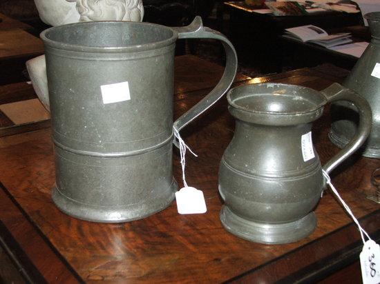 Appraisal: AN ANTIQUE PEWTER LIDDED TANKARD of baluster form with shaped